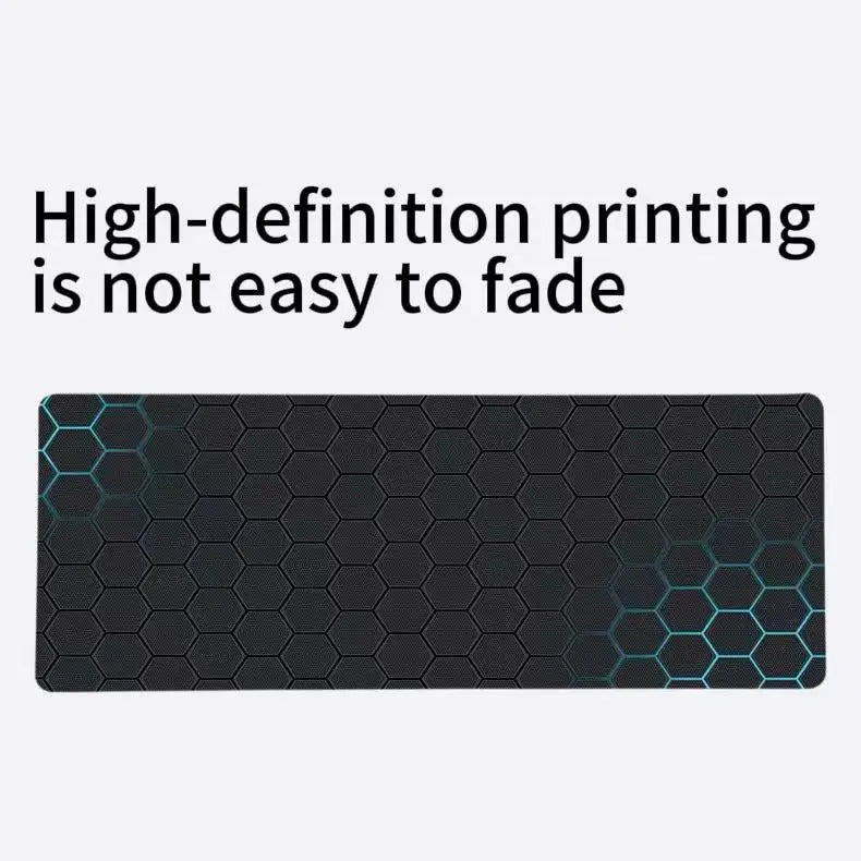 Hex-pattern technical drawing desk pad with teal outline accents on dark surface