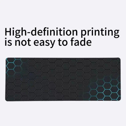 Hex-pattern technical drawing desk pad with teal outline accents on dark surface