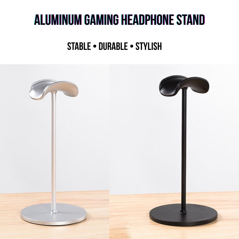 Two Aluminum Gaming Headphone Stands, one silver and one black, are displayed side by side. Each sturdy headset holder features a curved top and round base, perfect for any PC or gaming setup. Stable, durable, and stylish—ideal for your desk.