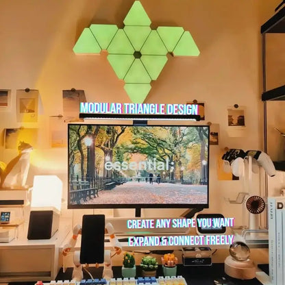 Green modular triangle LED wall light panels arranged in a honeycomb pattern