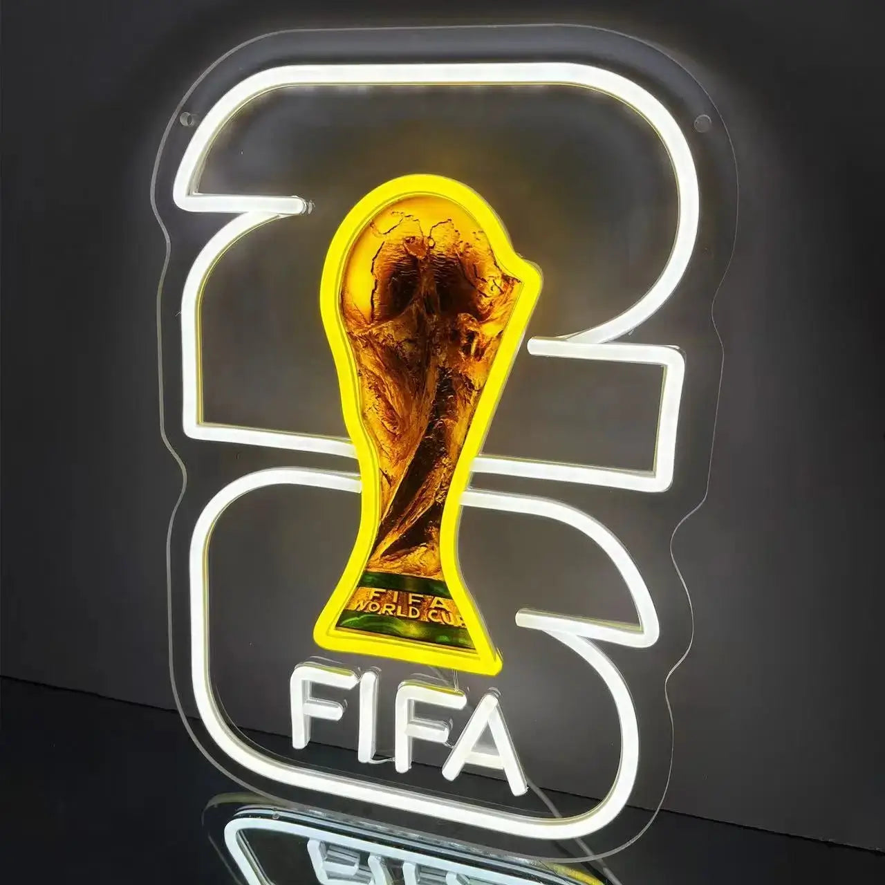 Neon “1” trophy World Cup sign with gold center and white glowing outlines