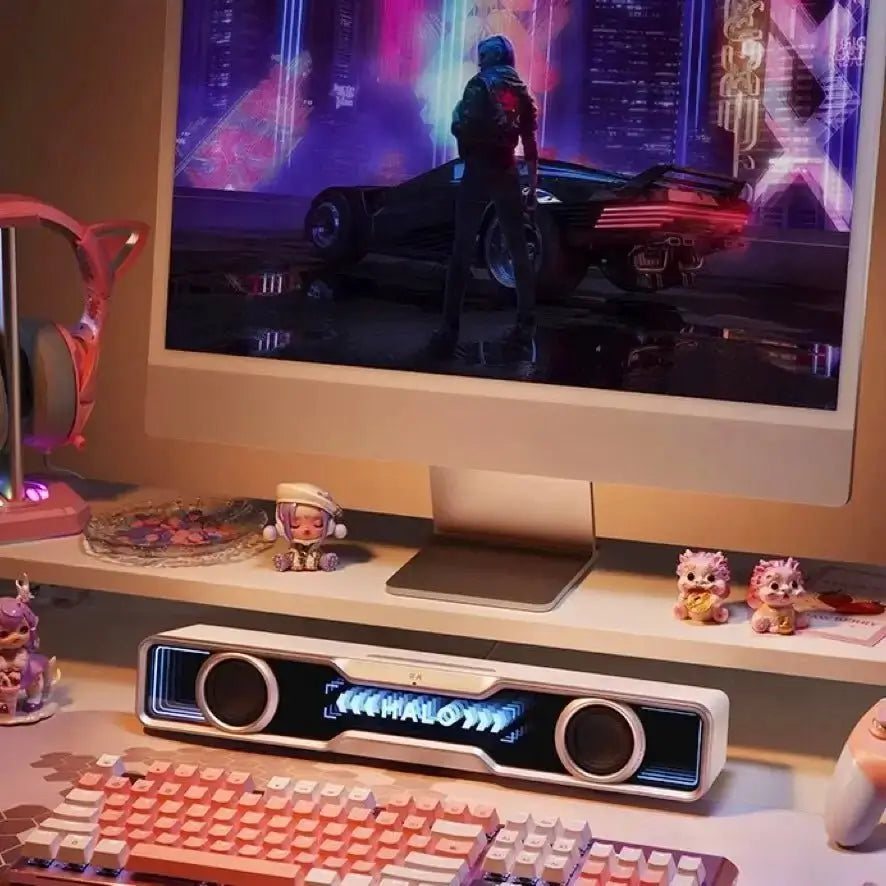RGB gaming soundbar with two round speaker ports and blue light glow