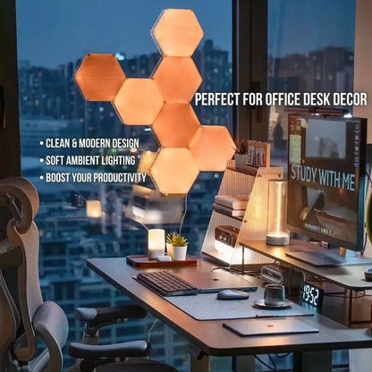 RGB hexagon wall panels glowing warm orange above an office desk decor