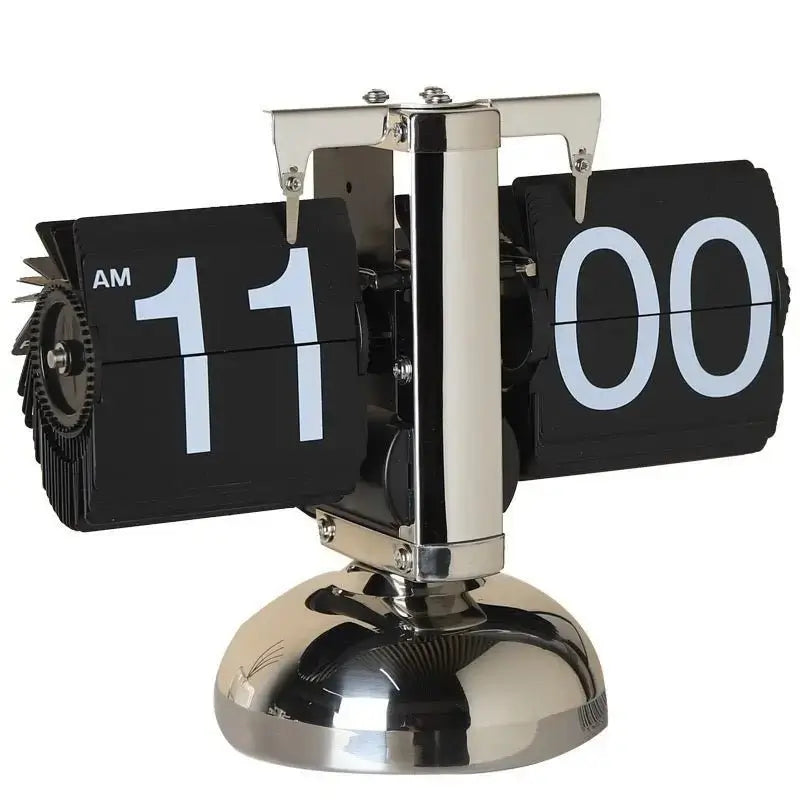 Retro flip clock with black flip pages showing 11 and 00, chrome pedestal base