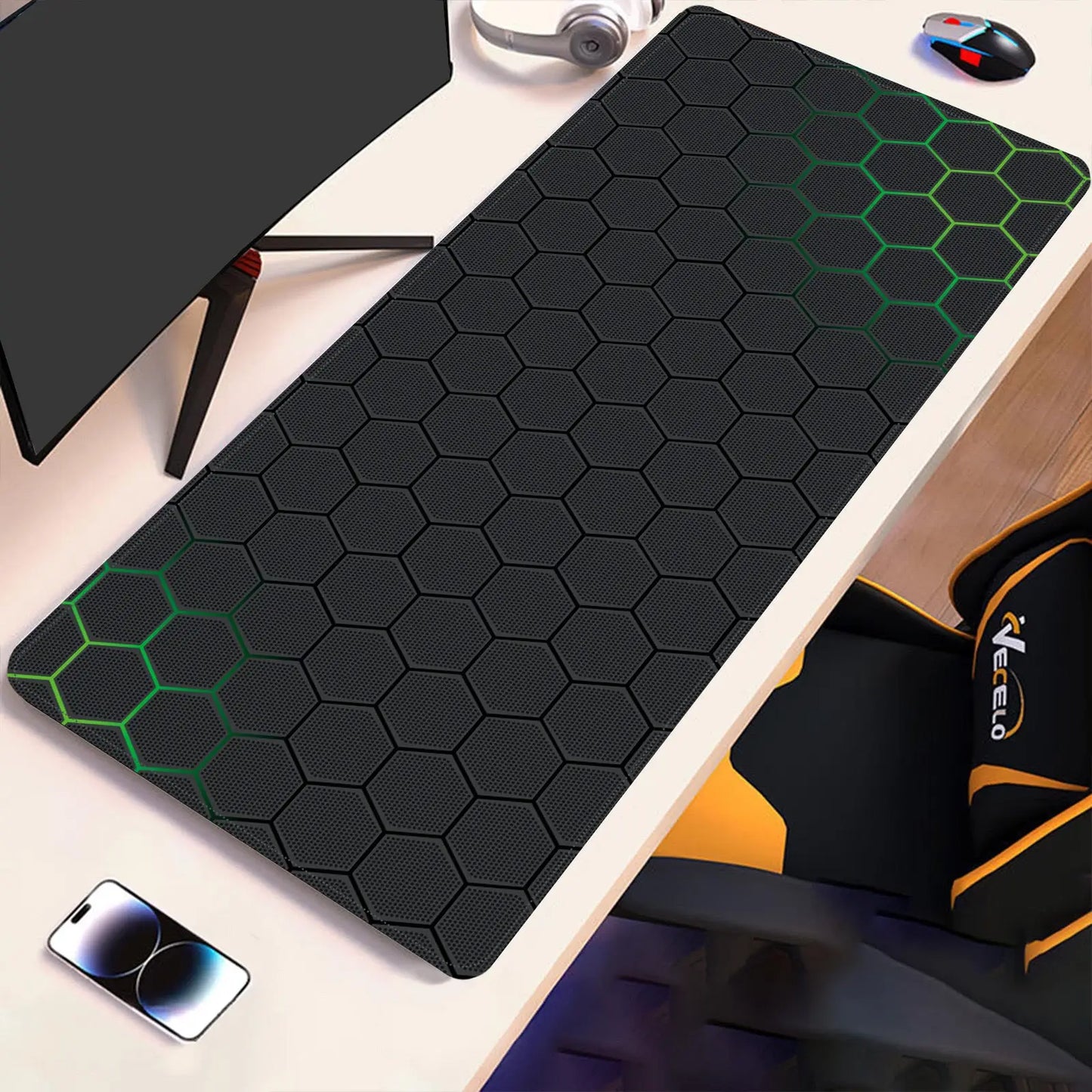 Black hex-pattern desk pad with neon green accent hexes