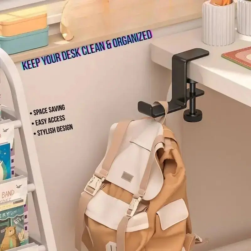 Black desk clamp headphone holder on desk edge supporting headphones