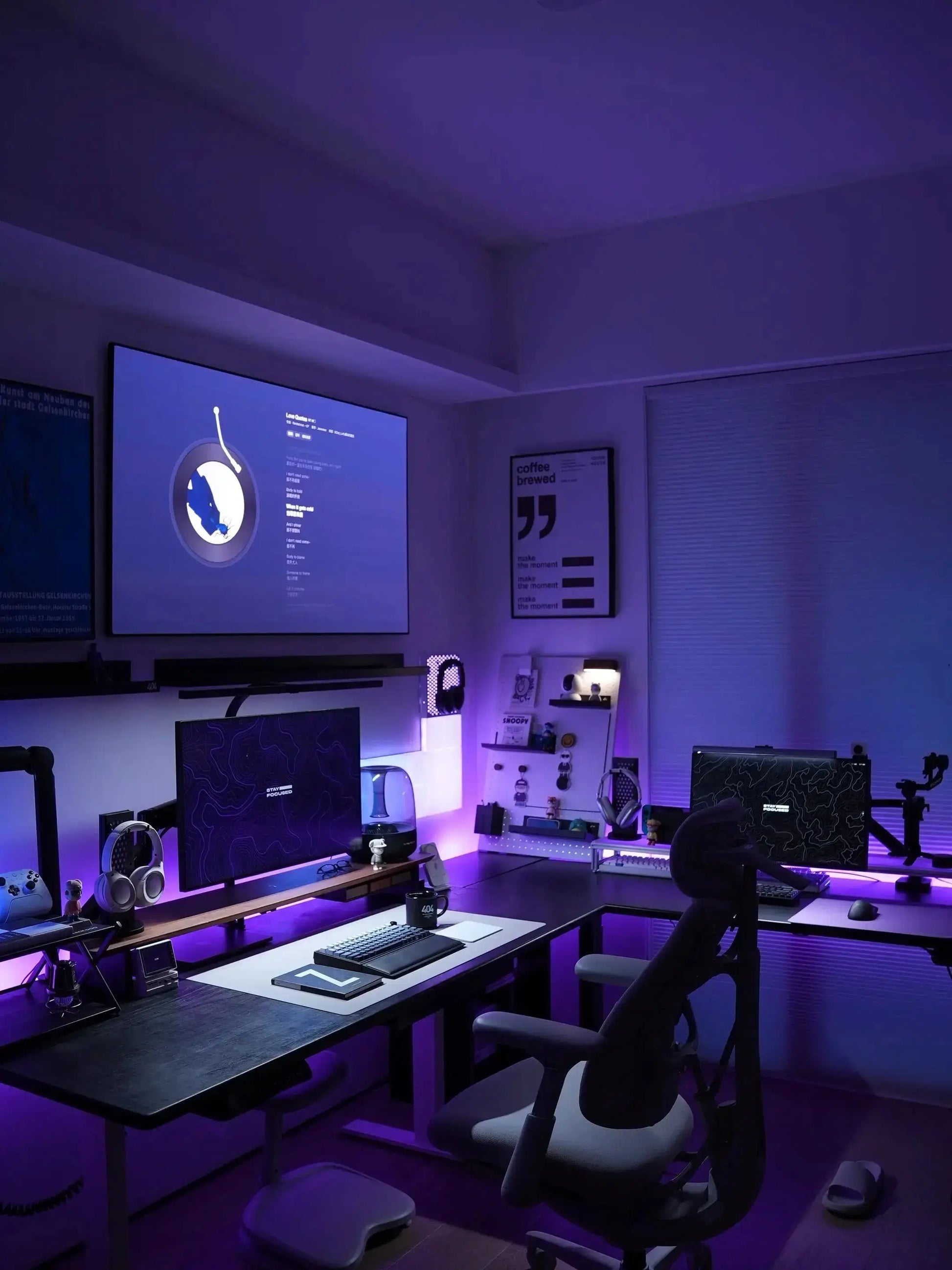 Large gaming desk mat with abstract dark pattern and smooth surface in a home office