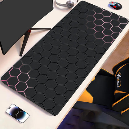 Black hex-pattern desk pad with pink accent hex lines