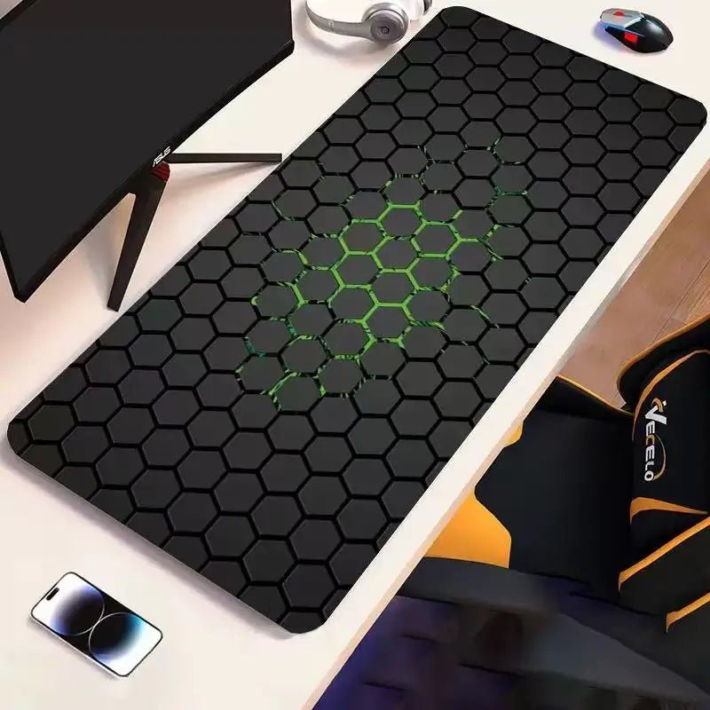 Black hex-pattern desk pad with green accent grid