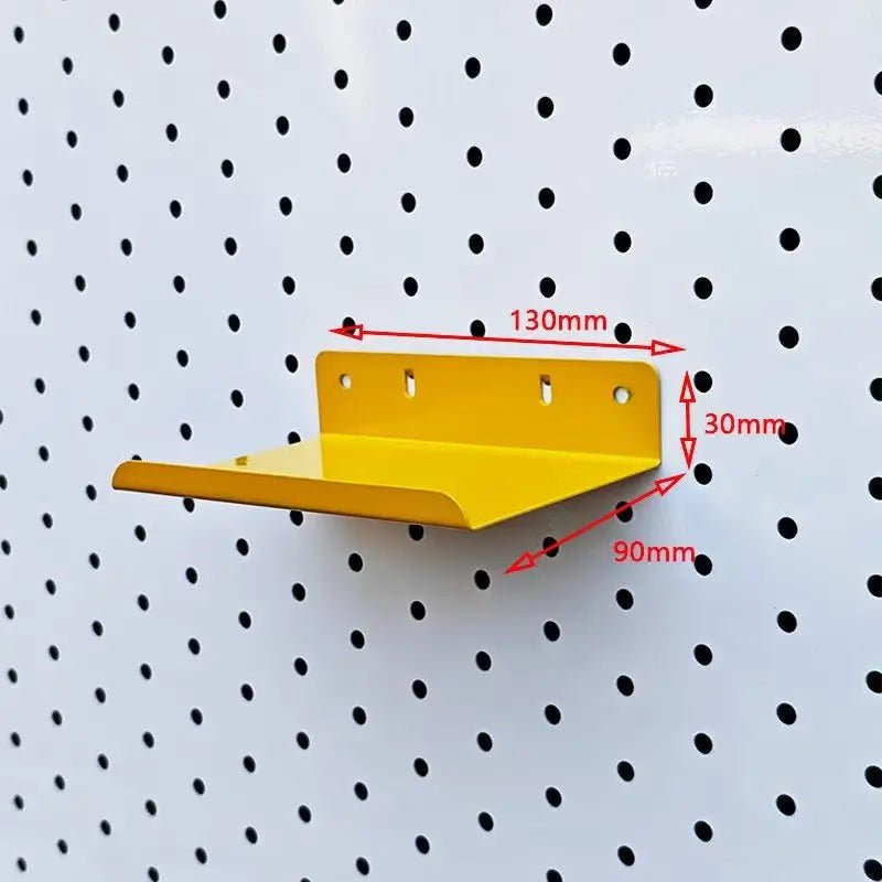 Yellow metal pegboard shelf with shallow tray and rear mounting plate
