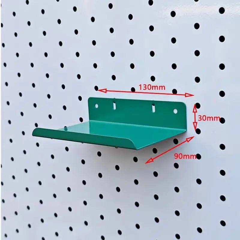 Green metal pegboard shelf with rear plate and shallow tray, 130mm