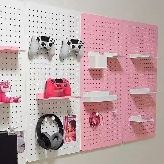 Pink and white modular pegboard wall panels with evenly spaced round holes