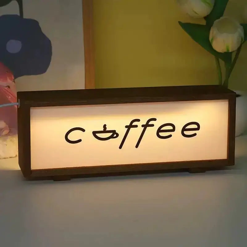 Walnut LED light box displaying coffee icon text in warm light