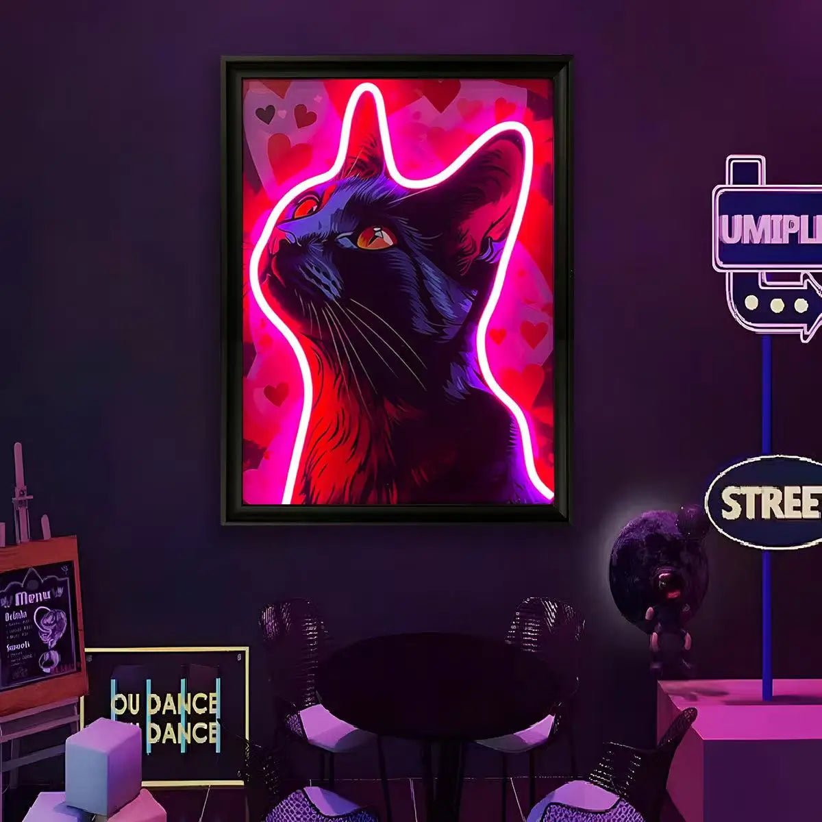 Framed LED wall art with neon cat silhouette, glowing pink outline and hearts