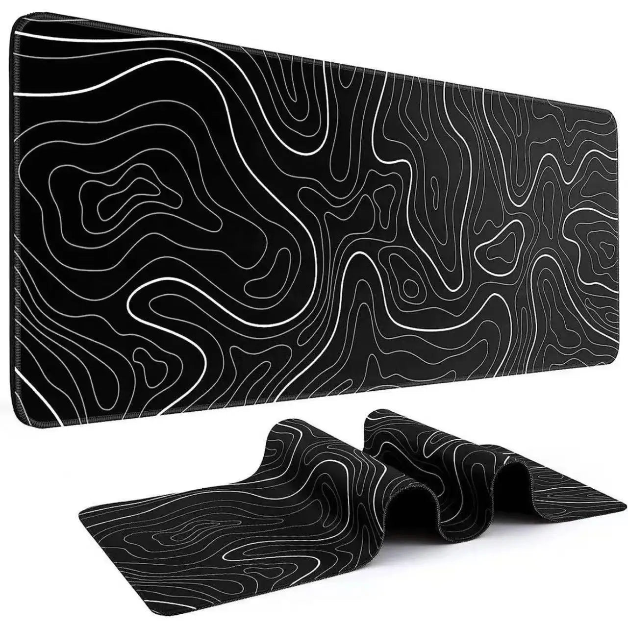 Folded black desk mat showing white contour lines and rounded stitched border