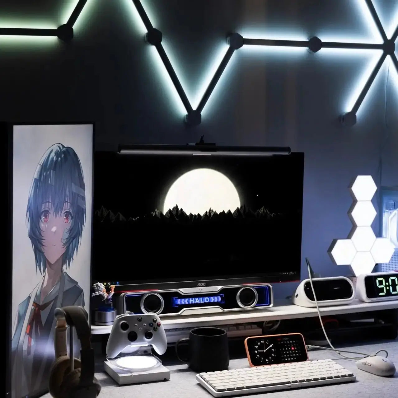RGB gaming soundbar with twin circular drivers and blue LED frame on desk