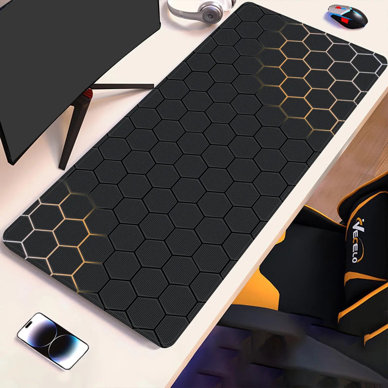 Black hex-pattern desk pad with gold accent lines