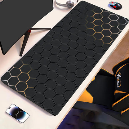 Black hex-pattern desk pad with gold accent lines