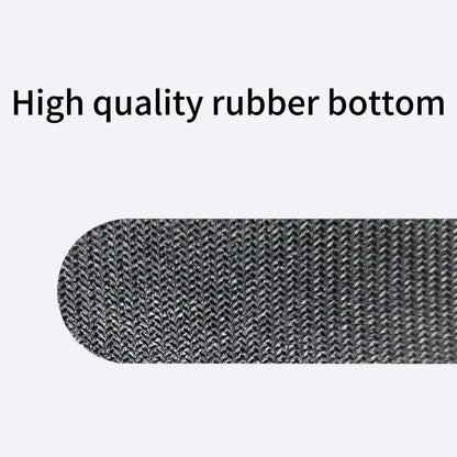 Textured rubber-backed underside of a hex-pattern desk pad in dark gray